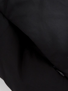 Detail of high-density black fabric texture with high-quality hidden zipper and stitching
