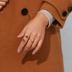 Three-piece minimalist 18K gold-plated square zircon rings for women shown on hand