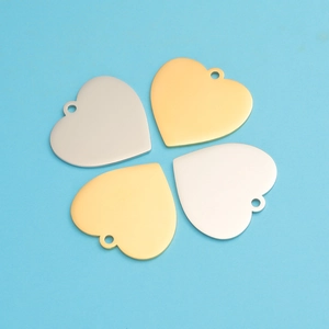 Polished heart-shaped stainless steel charms in gold and silver for jewelry making