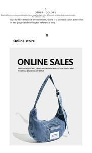 Detail view of washed blue denim hobo bag featuring a zipper pocket and white label tag