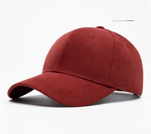 Detail view of red cotton baseball cap with six-panel structure and embroidered eyelets