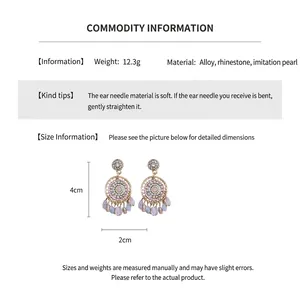 Detailed size info of dreamcatcher earrings with rhinestones and purple bead fringe