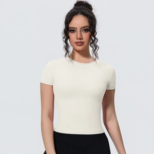 Close-up of slim-fit ivory yoga t-shirt showing breathable fabric and crew neck