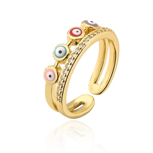 Close-up of 18K gold plated evil eye ring with colorful enamel and zircon stones