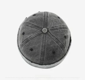Top view of washed cotton docker cap with six-panel structure and vintage texture