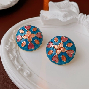 Royal blue enamel round stud earrings with red hearts and orange floral patterns