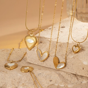 18k gold plated titanium steel necklaces with heart and eye shaped shell pendants