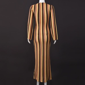 Macro shot of wavy knit texture and multi-color stripe pattern on the back of this dress