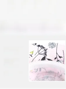 Detail of floral printed pink bucket hat showing inner lining and premium stitching quality