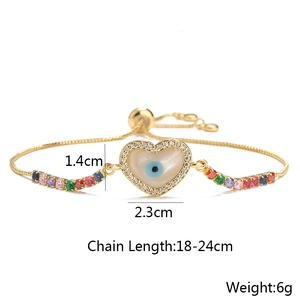 Detail of colorful cubic zirconia evil eye heart bracelet with adjustable chain