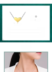 Detail of 925 sterling silver heart necklace with dimensions 4.8mm and 40cm chain length