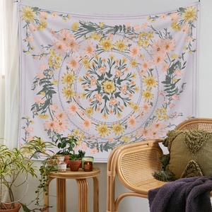 Detail of floral mandala tapestry with purple background and bohemian circular patterns