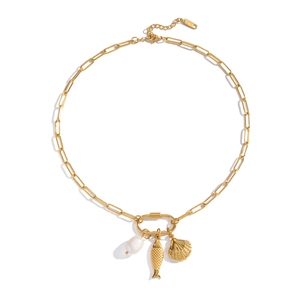 Detail of 18K gold stainless steel chain with pearl, fish, and shell charms on white background