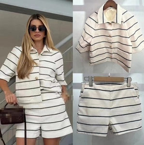 Women's black and white striped tweed set with short sleeve cardigan and matching shorts
