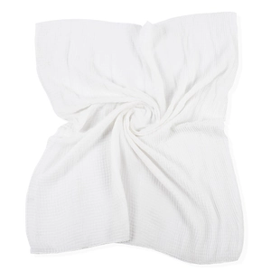 Macro shot of white pleated muslin scarf fabric with soft texture and spiral fold