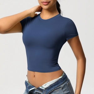 Close-up of slim-fit dark blue cropped sports t-shirt with high elasticity fabric