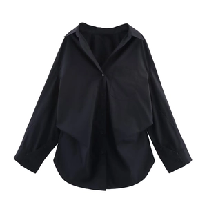 Detailed flat lay of black long sleeve shirt with lapel collar and single chest pocket