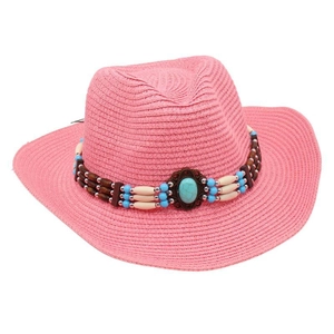 Detail of pink straw cowboy hat with ethnic beaded band and turquoise centerpiece