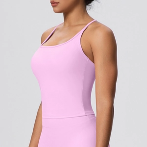 Side view of light pink high-stretch sports bra with thin straps and a slim-fit design