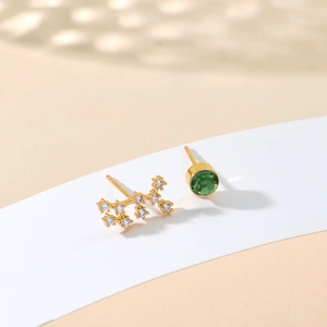 Asymmetric S925 silver zodiac stud earrings with green birthstone and gold plating