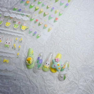 Japanese style 3D embossed nail art stickers with tulip and bunny designs on soft green pastel