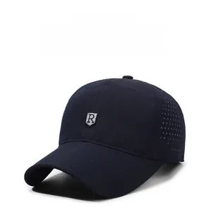 Detail showing breathable laser-cut side vents and 'R' logo on dark blue baseball cap