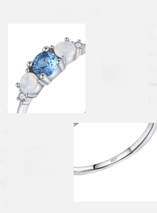 Macro detail of S925 sterling silver ring featuring blue zircon and precise S925 engraving