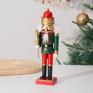 Detail of 25cm wooden nutcracker king ornament with golden scepter in Christmas setting