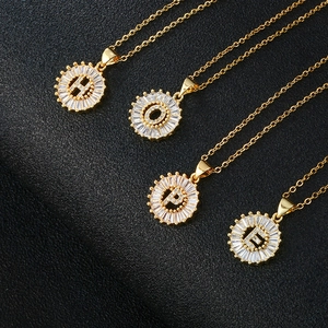 Gold plated initial pendant necklaces with cubic zirconia stones forming the word HOPE