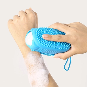Blue silicone body scrubber brush with foaming sponge for exfoliating and massaging
