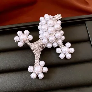 Luxury Poodle brooch with white pearls and sparkling crystals on premium black leather