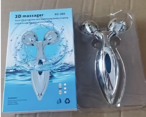 3D massager XC-300 silver roller and blue box for face lifting and body shaping
