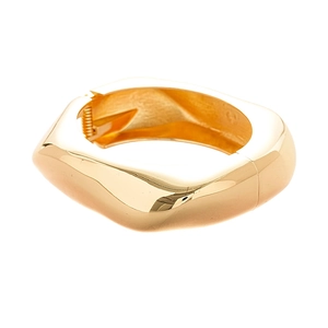 Bracciale a fascia irregolare geometrico in oro lucido con chiusura a cerniera e stile moderno