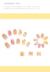 Detail of colorful press-on nails featuring smiley faces, floral patterns and wavy lines