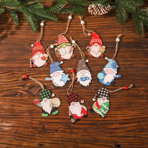 Set of 9 wooden Christmas gnome hanging ornaments with festive patterns and jute ropes