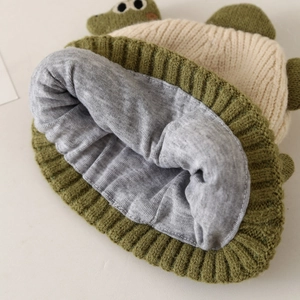 Kids knitted beanie with embroidered dinosaur design and warm grey lining for winter