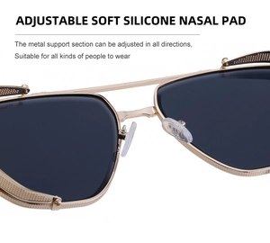 Detail of golden metal frame sunglasses with adjustable grey silicone nose pads