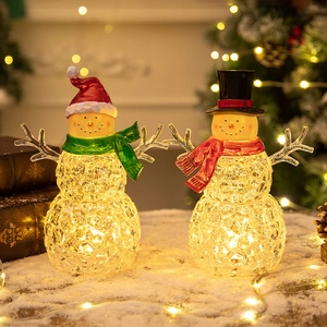 Glowing crystal snowman figurines with LED lights for Christmas desktop decor and gifts