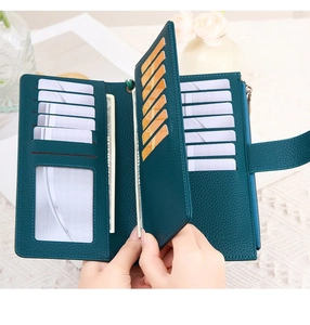 Detailed view of dark green RFID leather wallet with multiple card slots and zip pocket