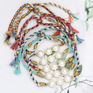 Colorful woven pearl bracelets with adjustable cords and gold beads for summer beach jewelry