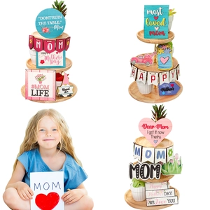 Tiered tray decor set for Mother's Day featuring wood signs and festive ornaments