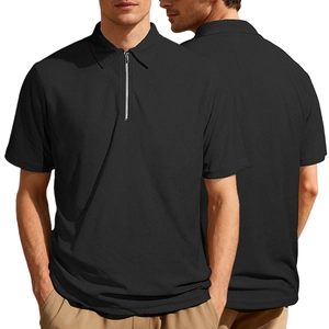 Detail of men's black polo shirt with waffle texture, zipper neck and breathable knit fabric