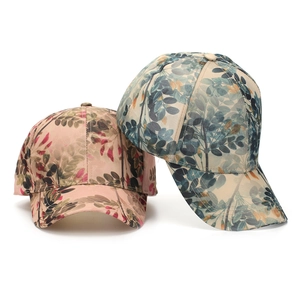 Ethnic style floral baseball caps for women with pink and blue leaf print designs