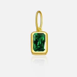 Macro shot of rectangular emerald zircon pendant with gold-plated S925 silver setting