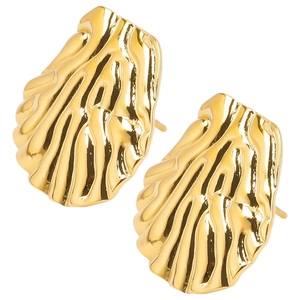 Detailed view of polished 18k gold plated stainless steel irregular shell earrings