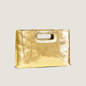 Metallic gold woven texture handbag with cutout handle and elegant metal chain strap