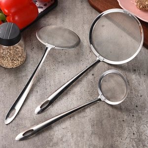 Set of three stainless steel fine mesh skimmers for oil filtering in a kitchen setting