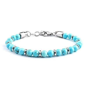 Detail of turquoise beaded bracelet with silver lobster clasp on white background