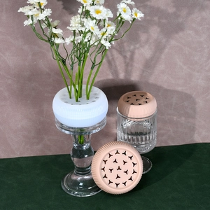 Spiral silicone flower stem holder in white and pink for floral arrangement vases