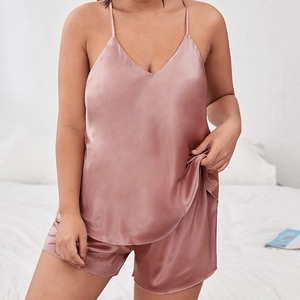 Pink silk satin pajama set with V-neck camisole and shorts for elegant home comfort